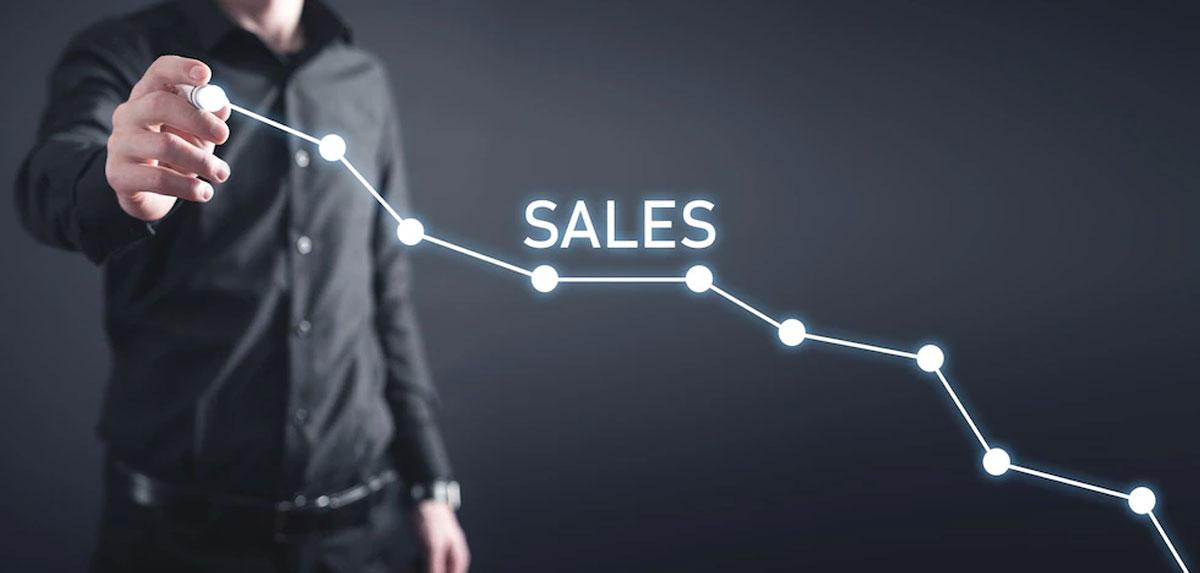 A man point out the sales graph