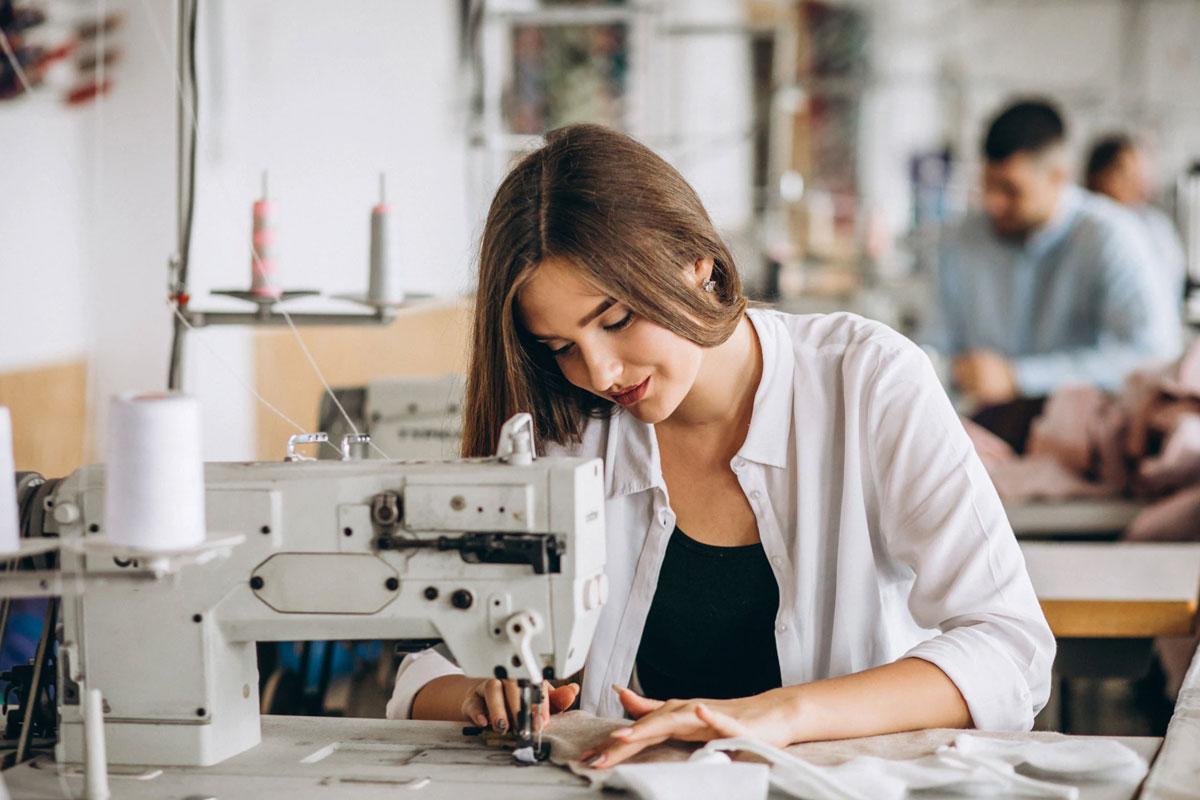 A hard working woman starting clothes.